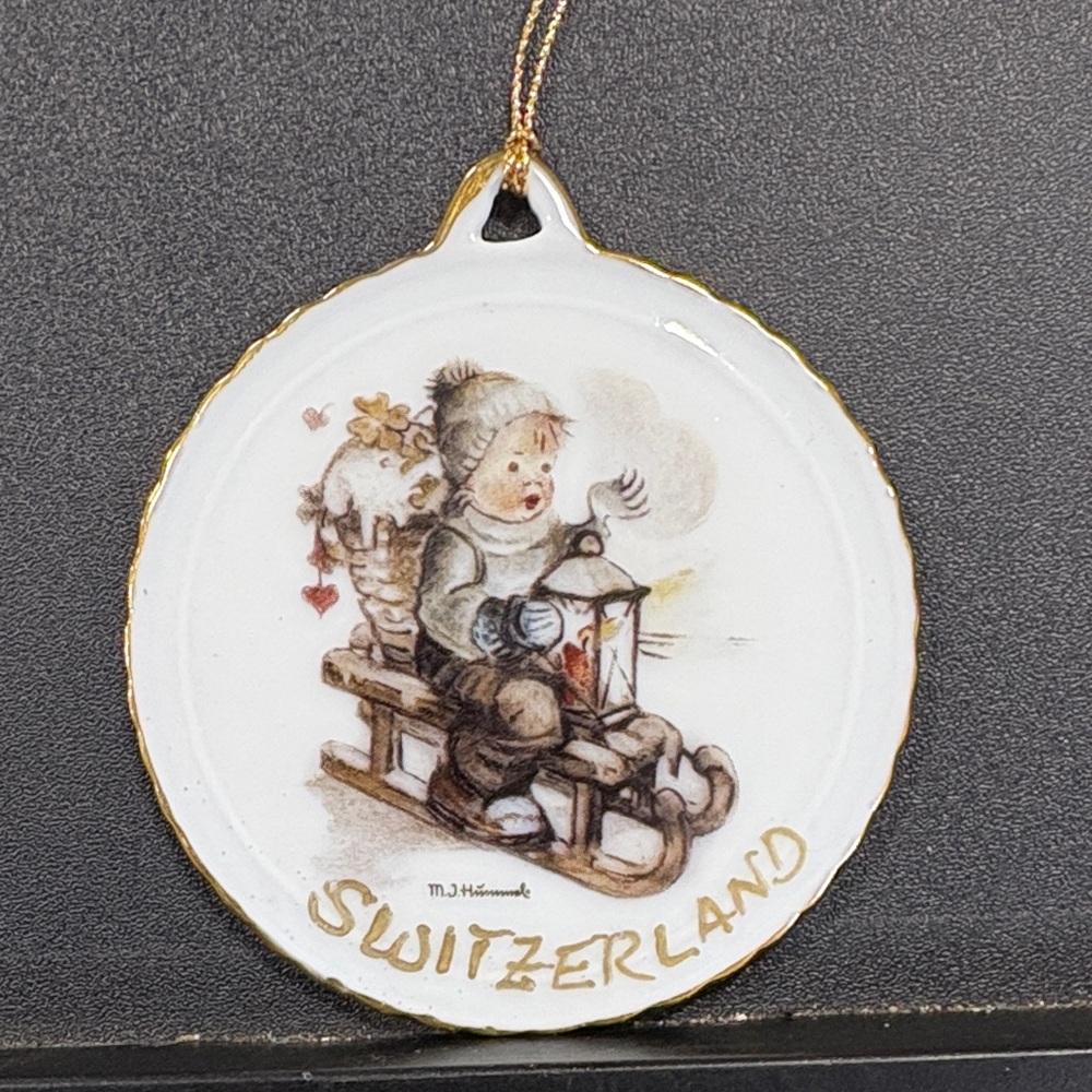 Vintage Hummel Christmas Ornament: Boy on Sled, Reutter Porzellan